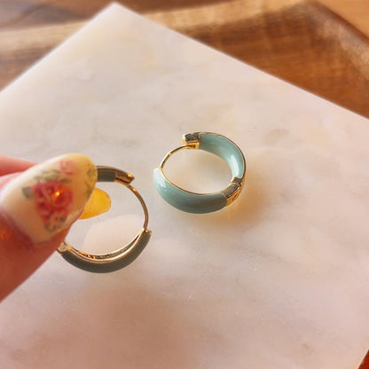 Heart seeker gold tiffany blue hoop earrings