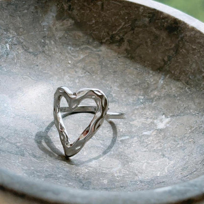 A place in my heart silver textured hollow heart ring