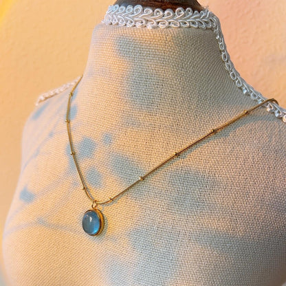 Aquamarine blue gem pendant gold necklace