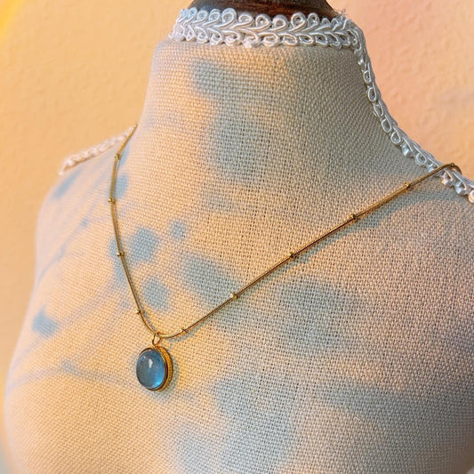 Aquamarine blue gem pendant gold necklace