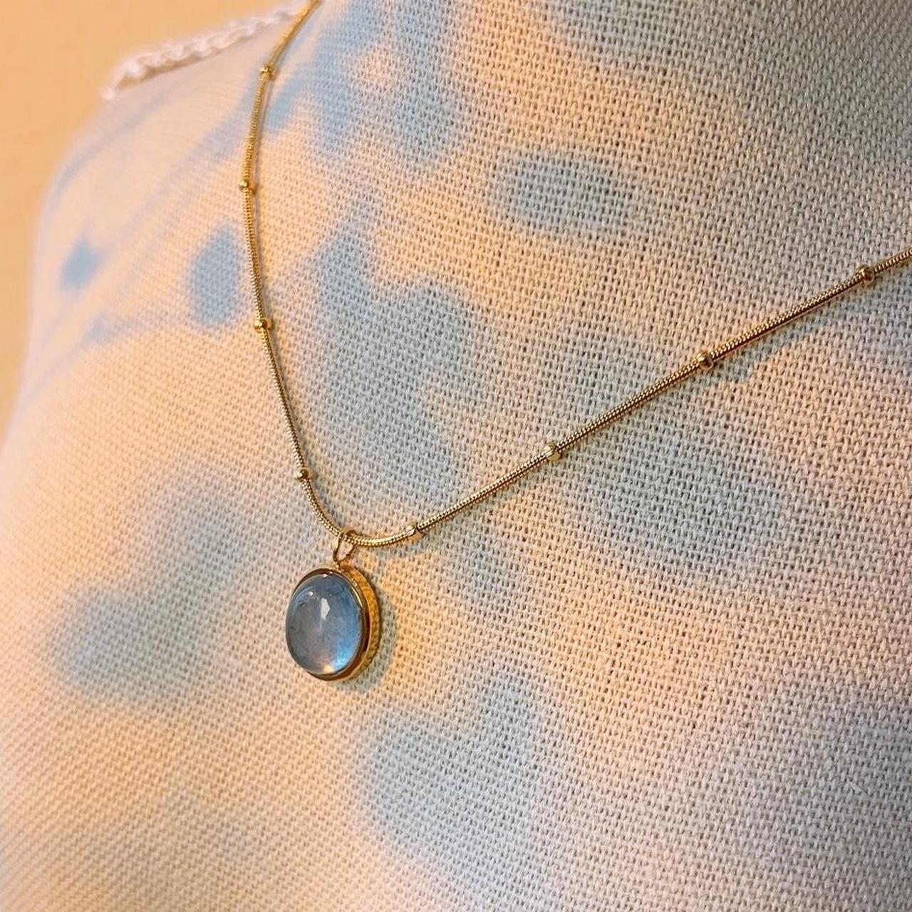 Aquamarine blue gem pendant gold necklace