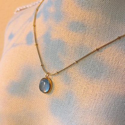 Aquamarine blue gem pendant gold necklace