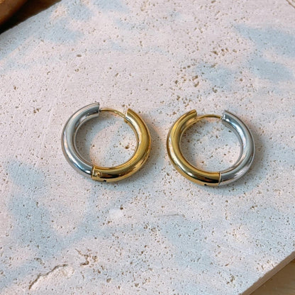 Gold and silver contrast medium hoop earrings