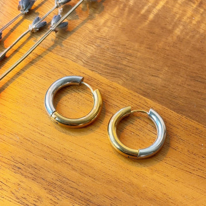 Gold and silver contrast medium hoop earrings