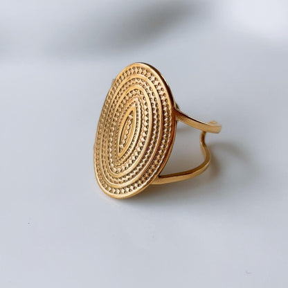 Gold medallion textured ring