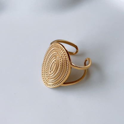 Gold medallion textured ring