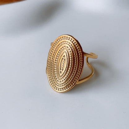 Gold medallion textured ring