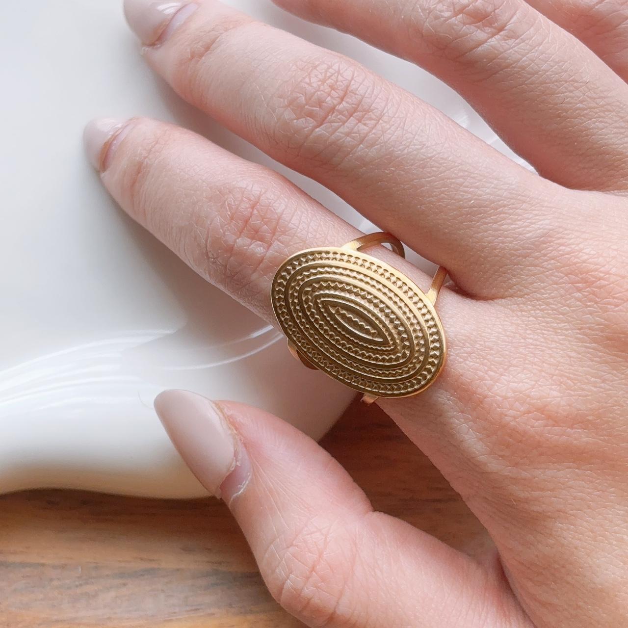 Gold medallion textured ring