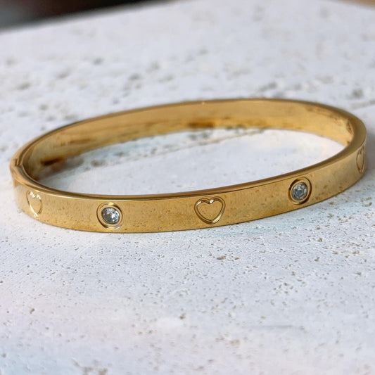 Heart engraved embellished gold bangle