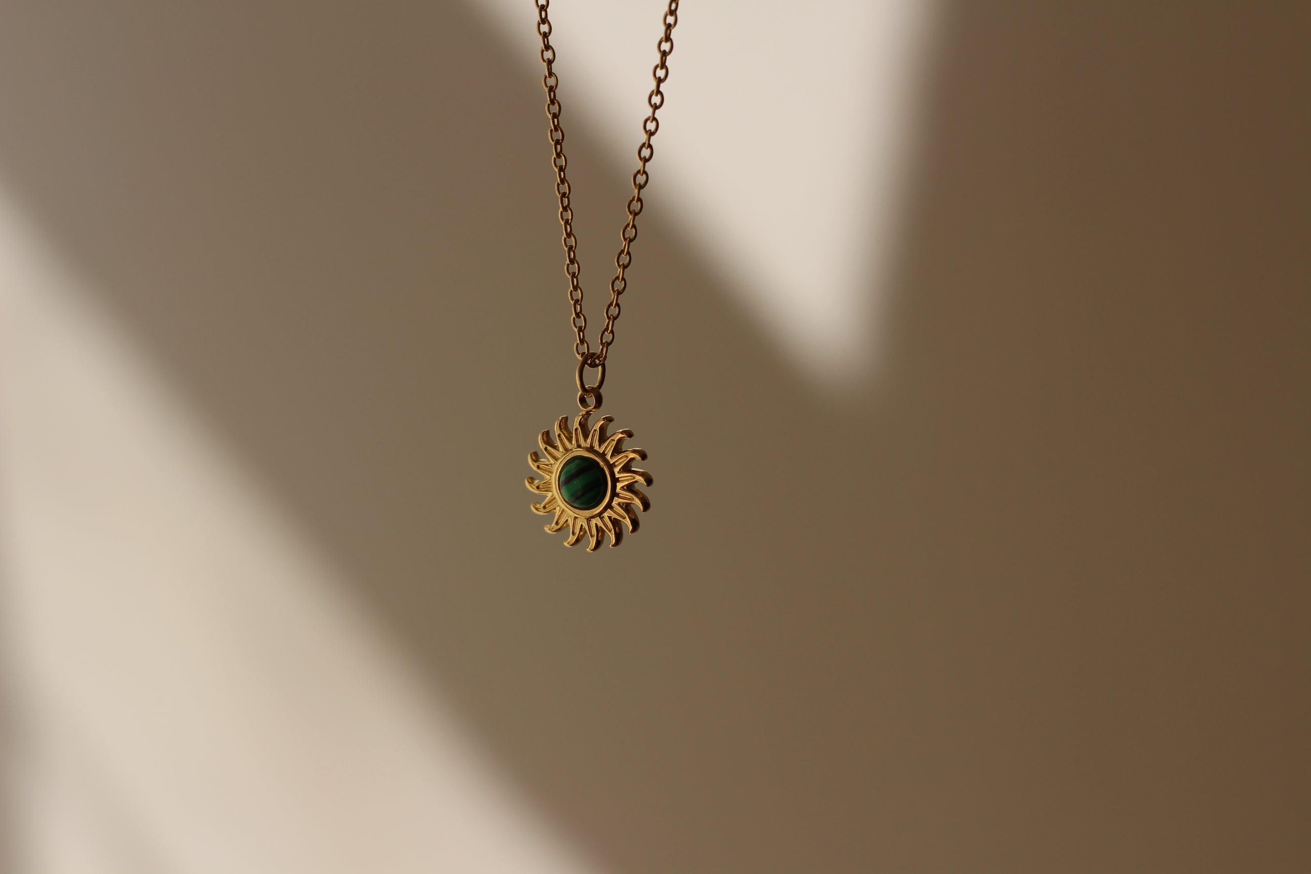 Emerald Sun Gold Necklace