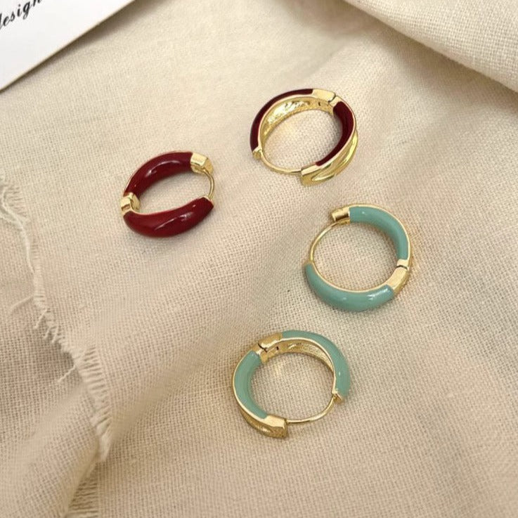 Heart seeker gold tiffany blue hoop earrings