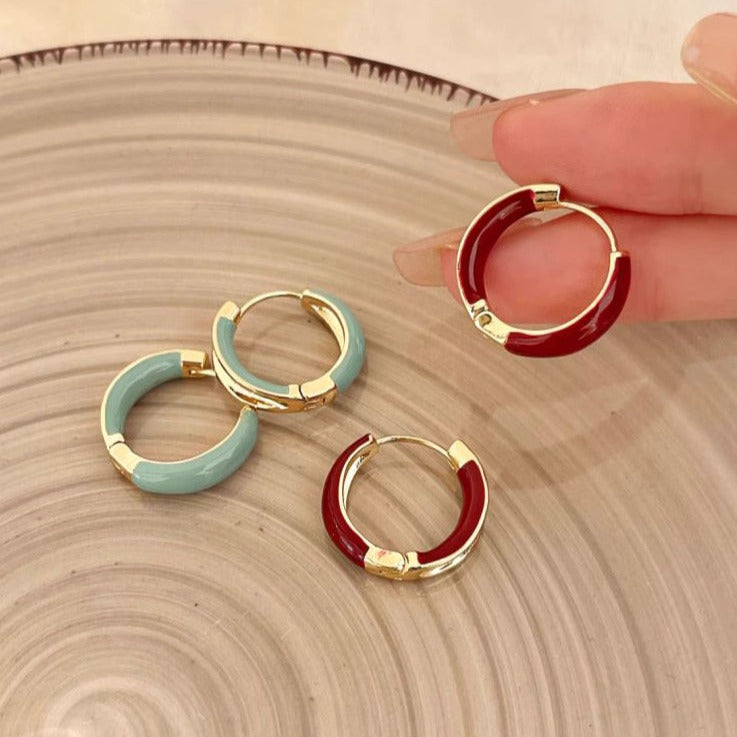 Heart seeker gold tiffany blue hoop earrings