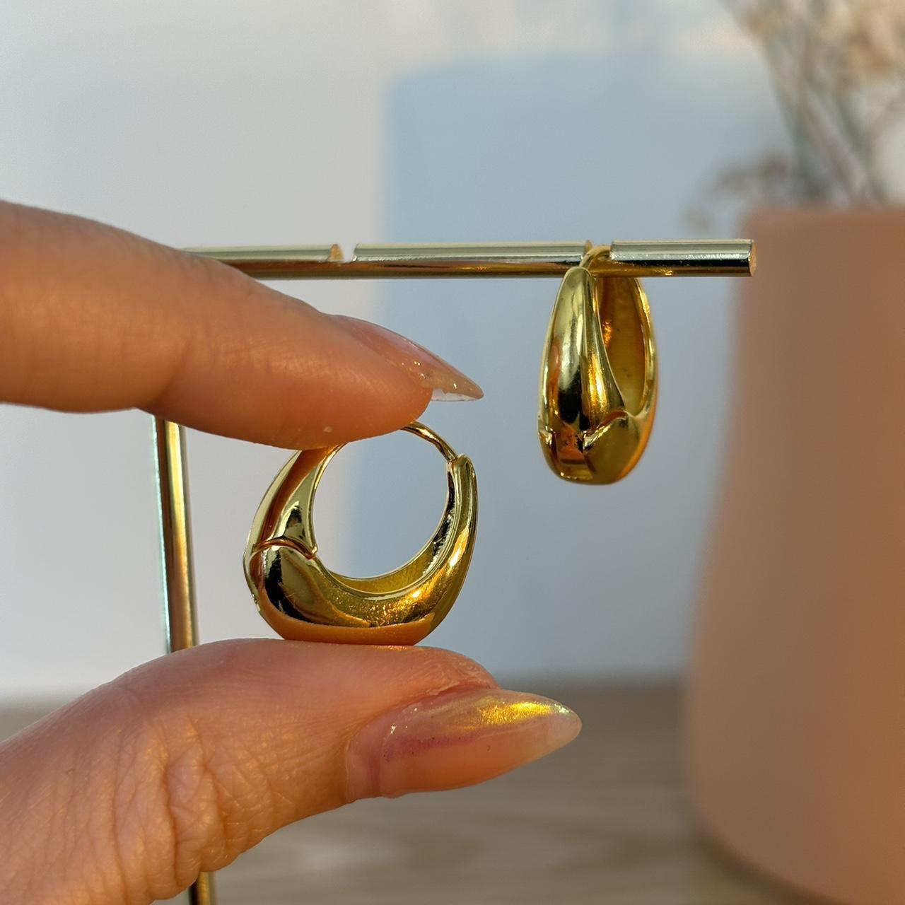 Lola golden crescent hoop earring