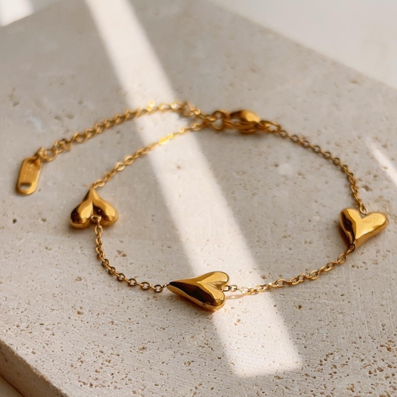 Trio heart gold bracelet