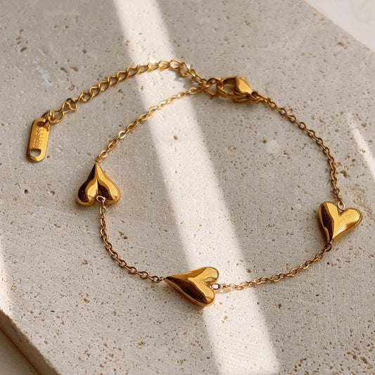 Trio heart gold bracelet