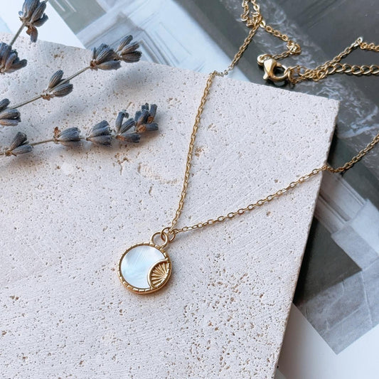 Ocean Eclipse gold pendant necklace