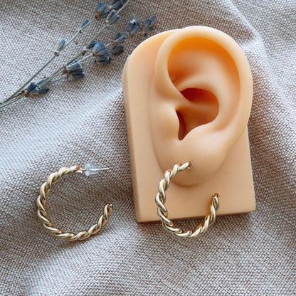 Twisted gold hoop stud earrings