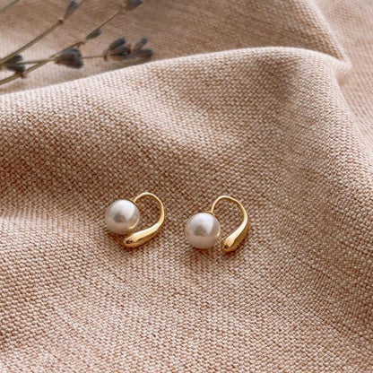 Heart of Pearl polished stud earrings