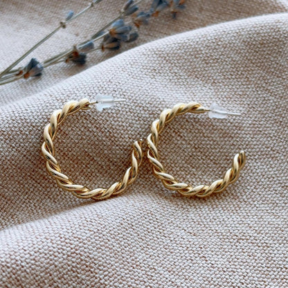 Twisted gold hoop stud earrings