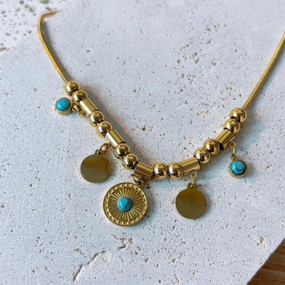 Rennes gold coin turquoise statement necklace