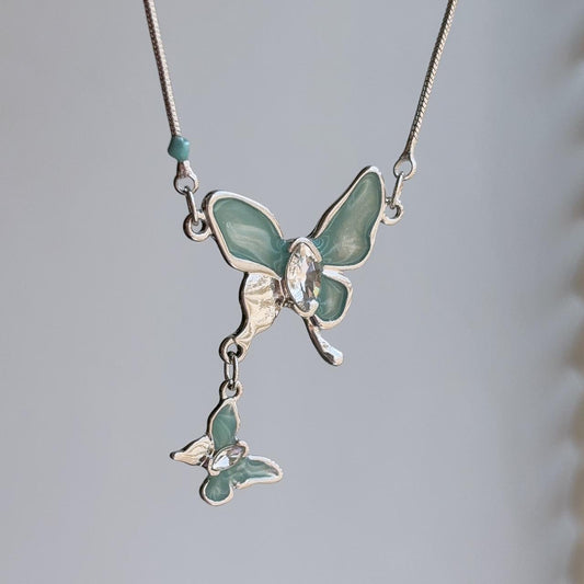 Tilly teal blue butterfly silver necklace