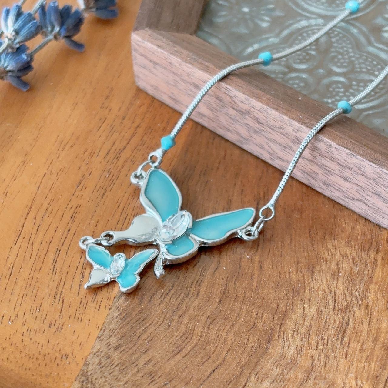 Tilly teal blue butterfly silver necklace