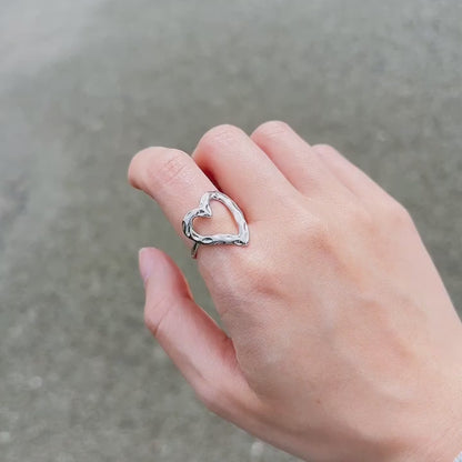 A place in my heart silver textured hollow heart ring